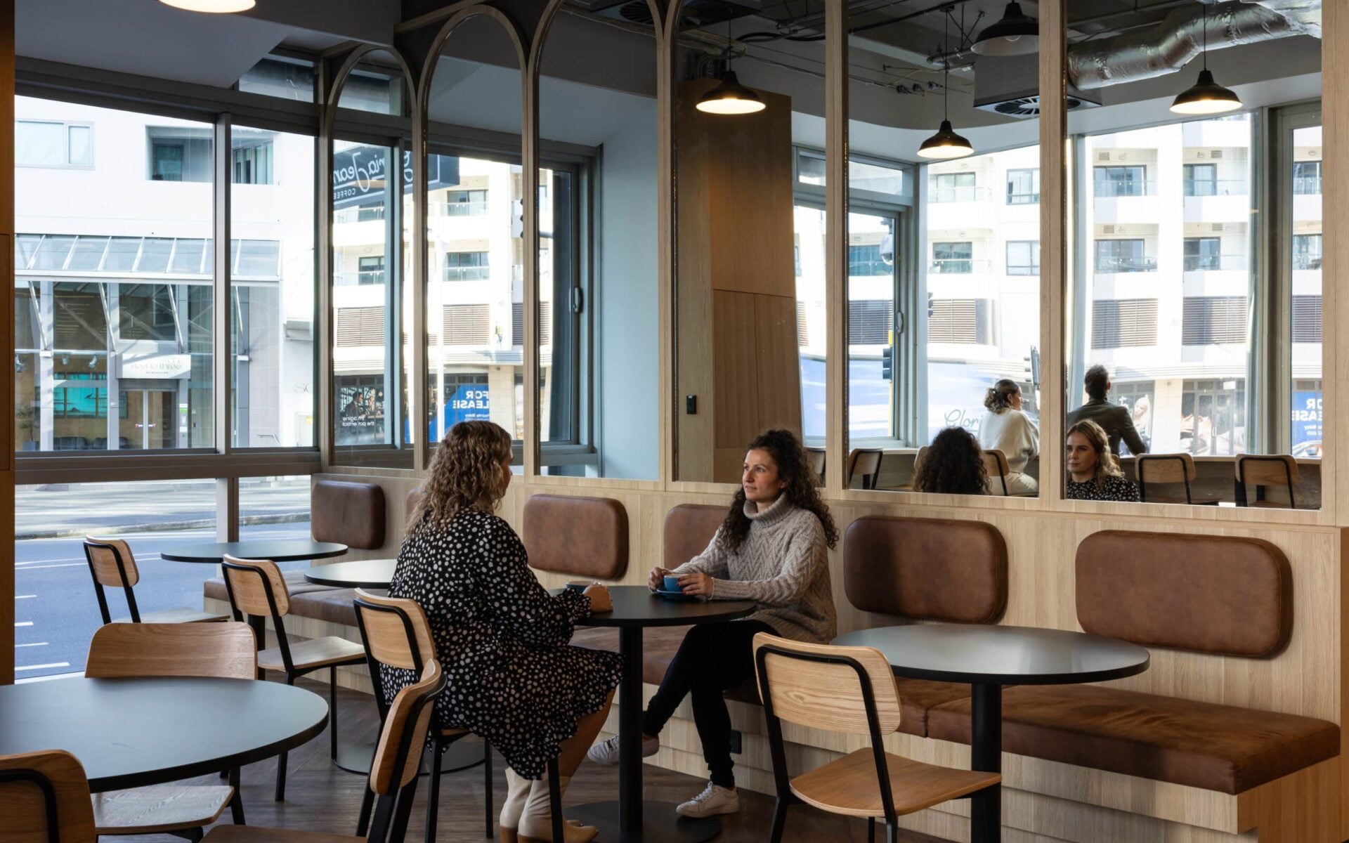 Modern Auckland building lobby with café amenity and informal meeting areas