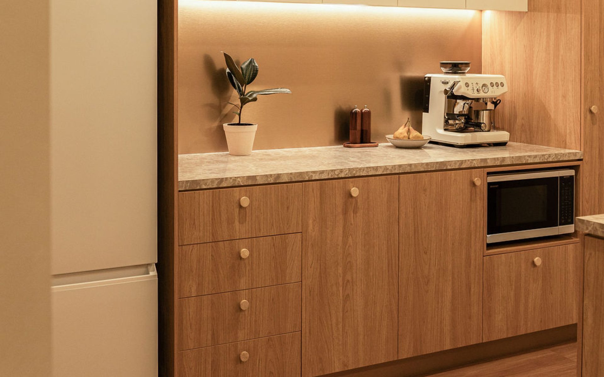 Premium law firm kitchen at Fifth Floor Chambers in Brisbane with warm finishes and refined workplace detailing